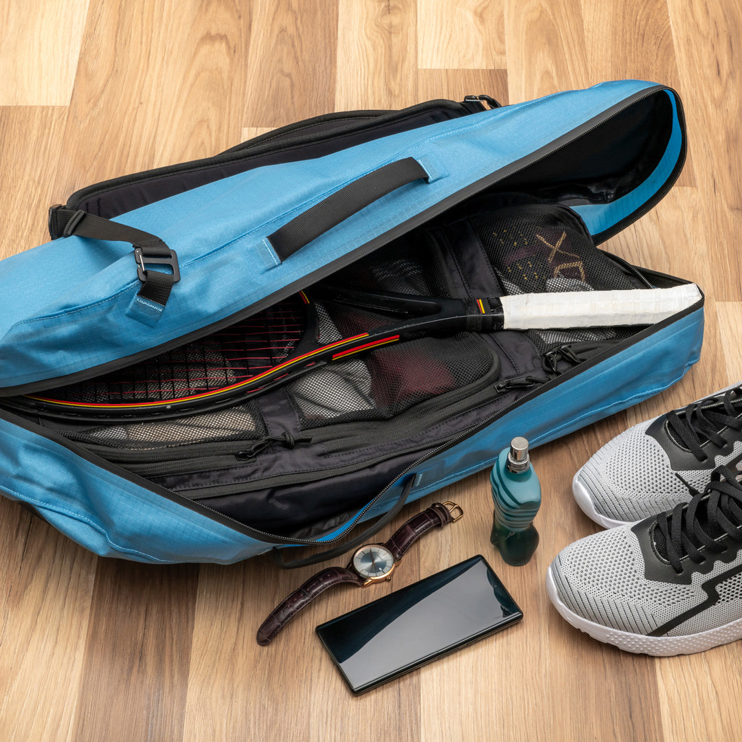 Open blue Voyager with the Pro Organizer and a tennis racquet