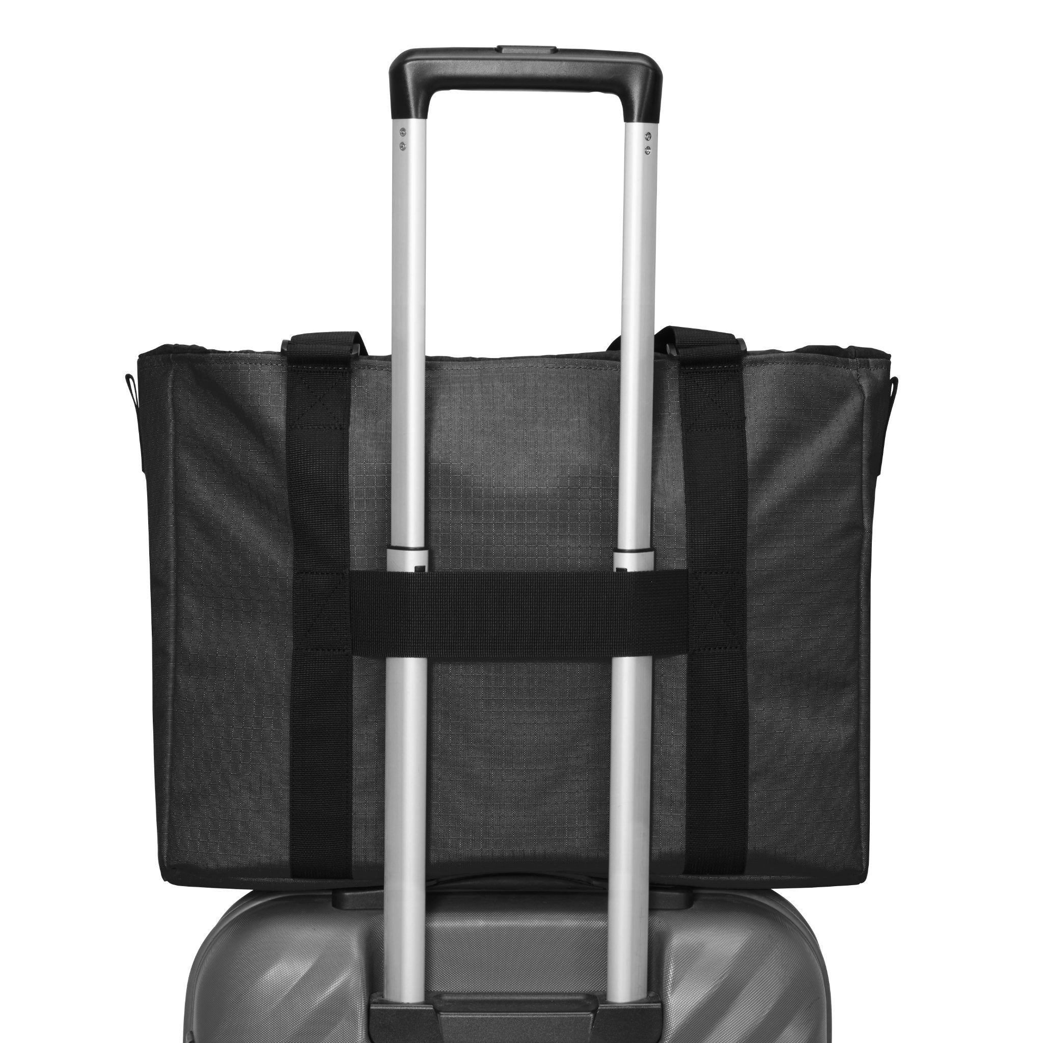 Black rolling suitcase with a black strap over it on a white background