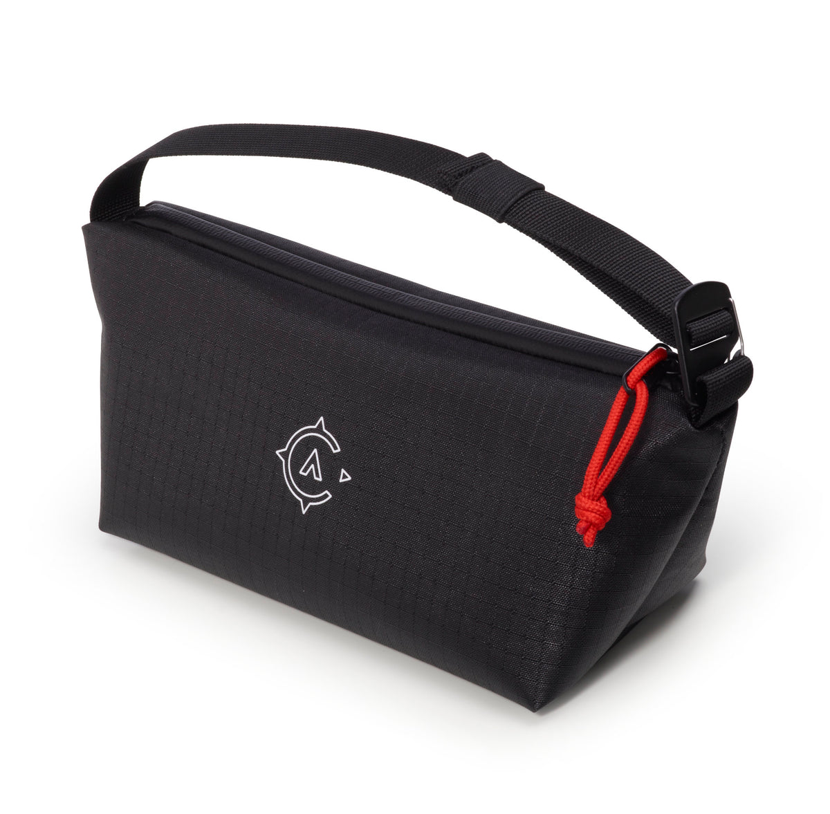 Black washbag with a red water-resitant zipper on a white background